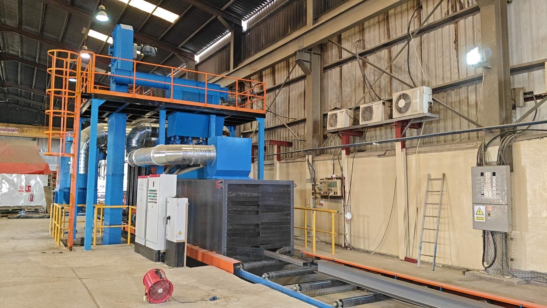 Successful Installation of Roller Conveyor Shot Blasting Machine in South Asia | Puhua Expands Global Reach
